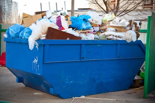 Recycling center accepting old furniture in Kilburn